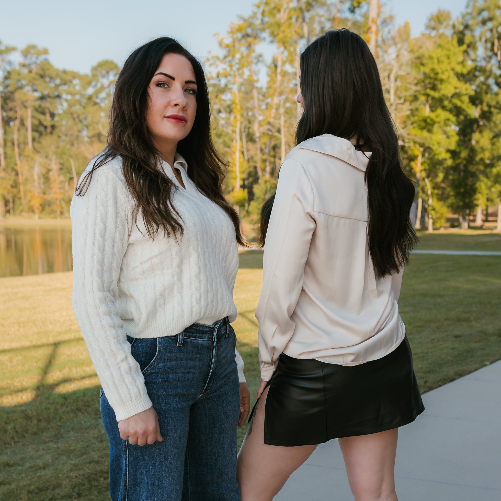 Stockbridge Styles modeling sweater knit top and Judy blue jeans with satin cream top and black leather skirt  a line